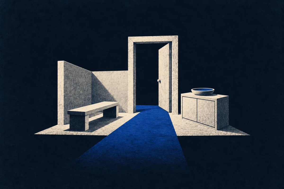 A cobalt path leads through an open door in a spare ivory room with a bench, cabinet, and basin.